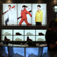 An advertisement shows freestyle skier Eileen Gu at an Anta store inside a shopping mall in Beijing.